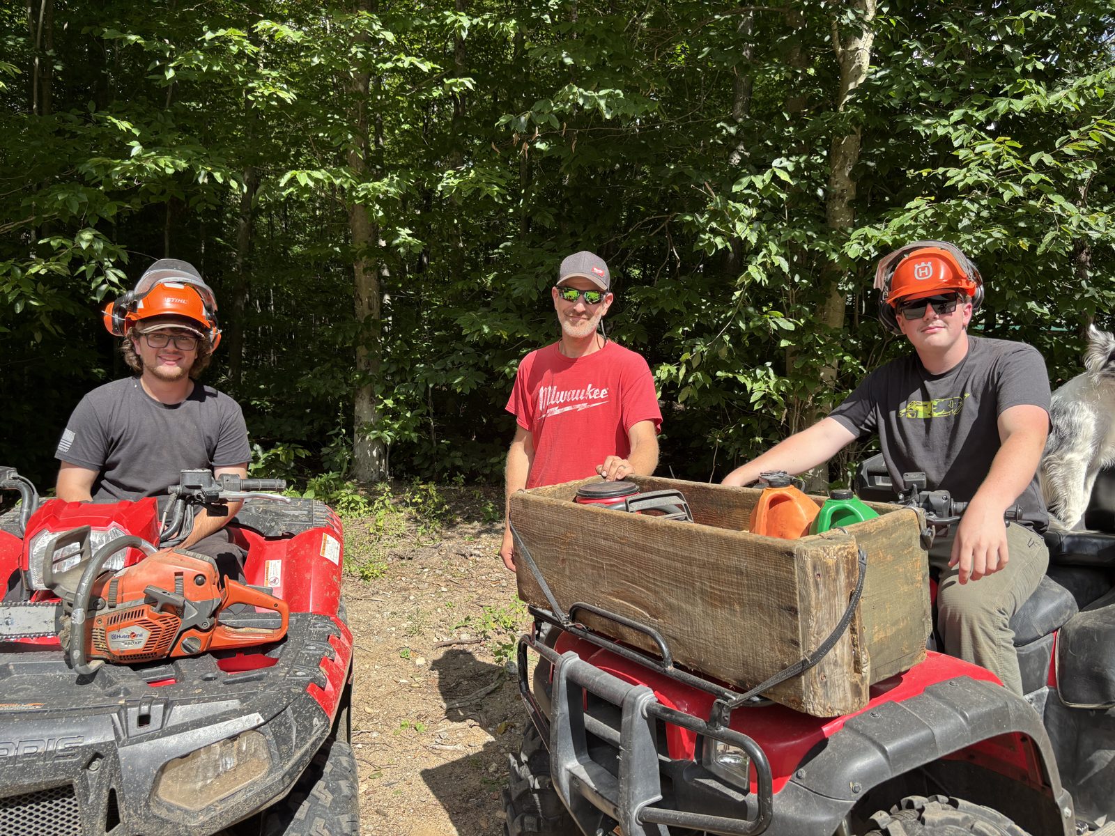 Three Tupper Lake students on a summer forestry crew