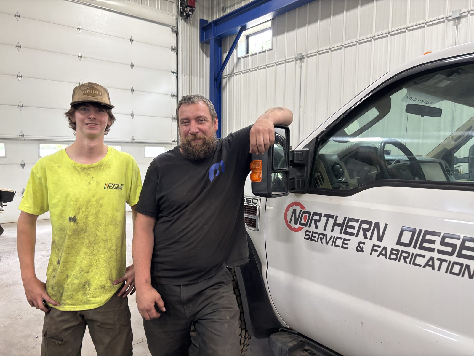A student with his summer employer at Northern Diesel Service and Fabrication / Kentile Excavating