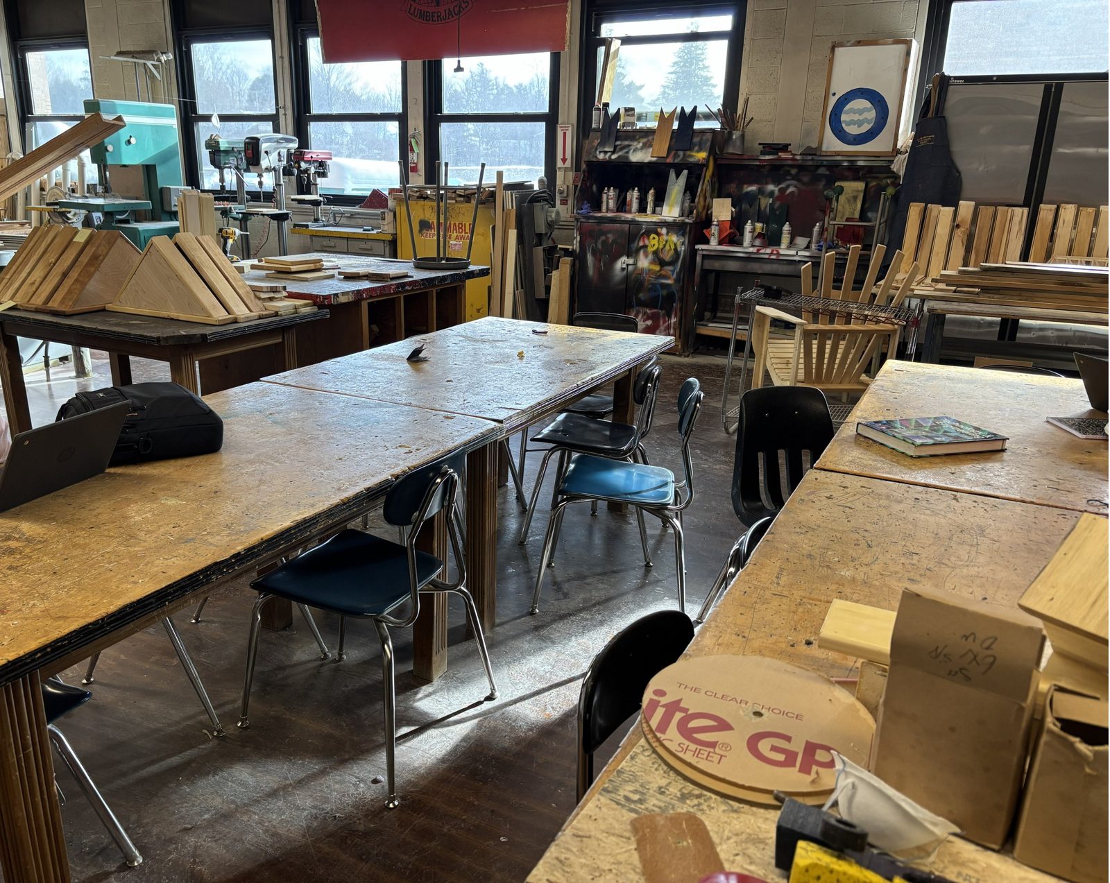 Student projects on the workbenches of the tech room